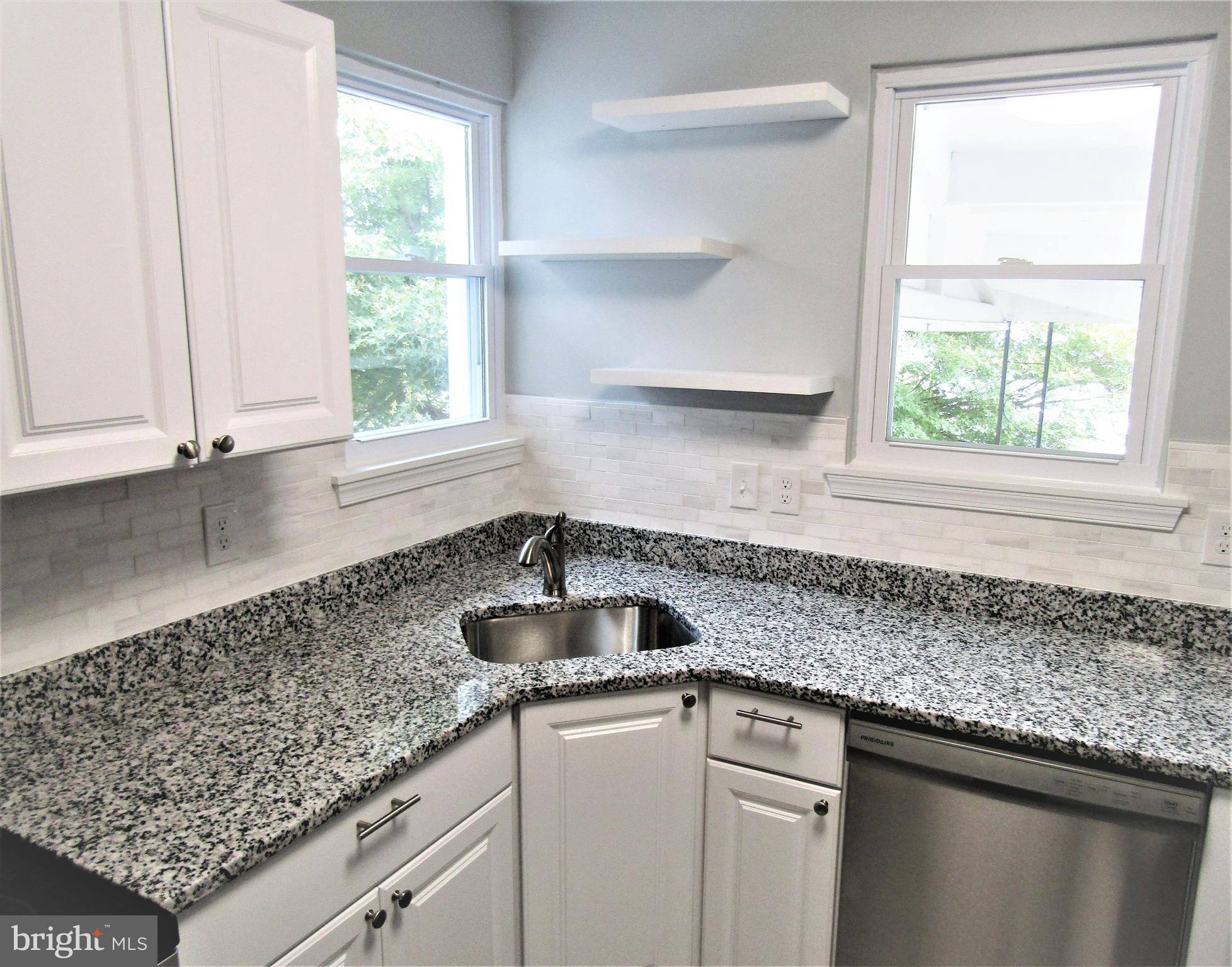 566 Forest View Road Linthicum Heights, MD 21090 - Photo 20 of 51 Kitchen- new granite countertops