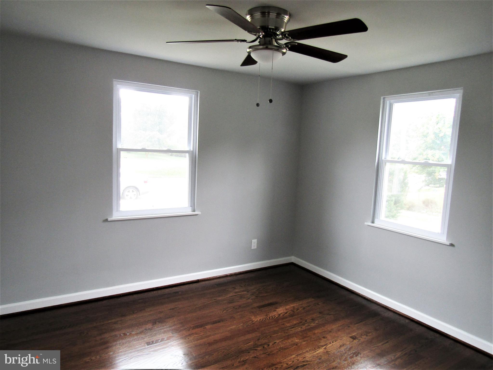 566 Forest View Road Linthicum Heights, MD 21090 - Photo 24 of 51 2nd bedroom-new windows and ceiling fan