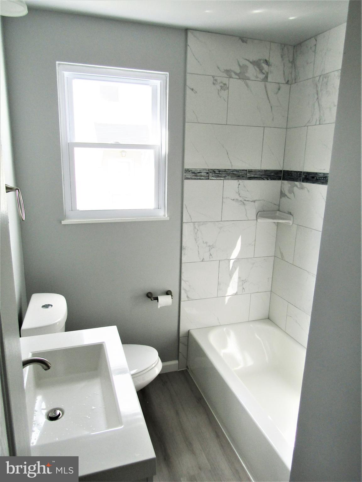 566 Forest View Road Linthicum Heights, MD 21090 - Photo 32 of 51 main bath- new tiled tub