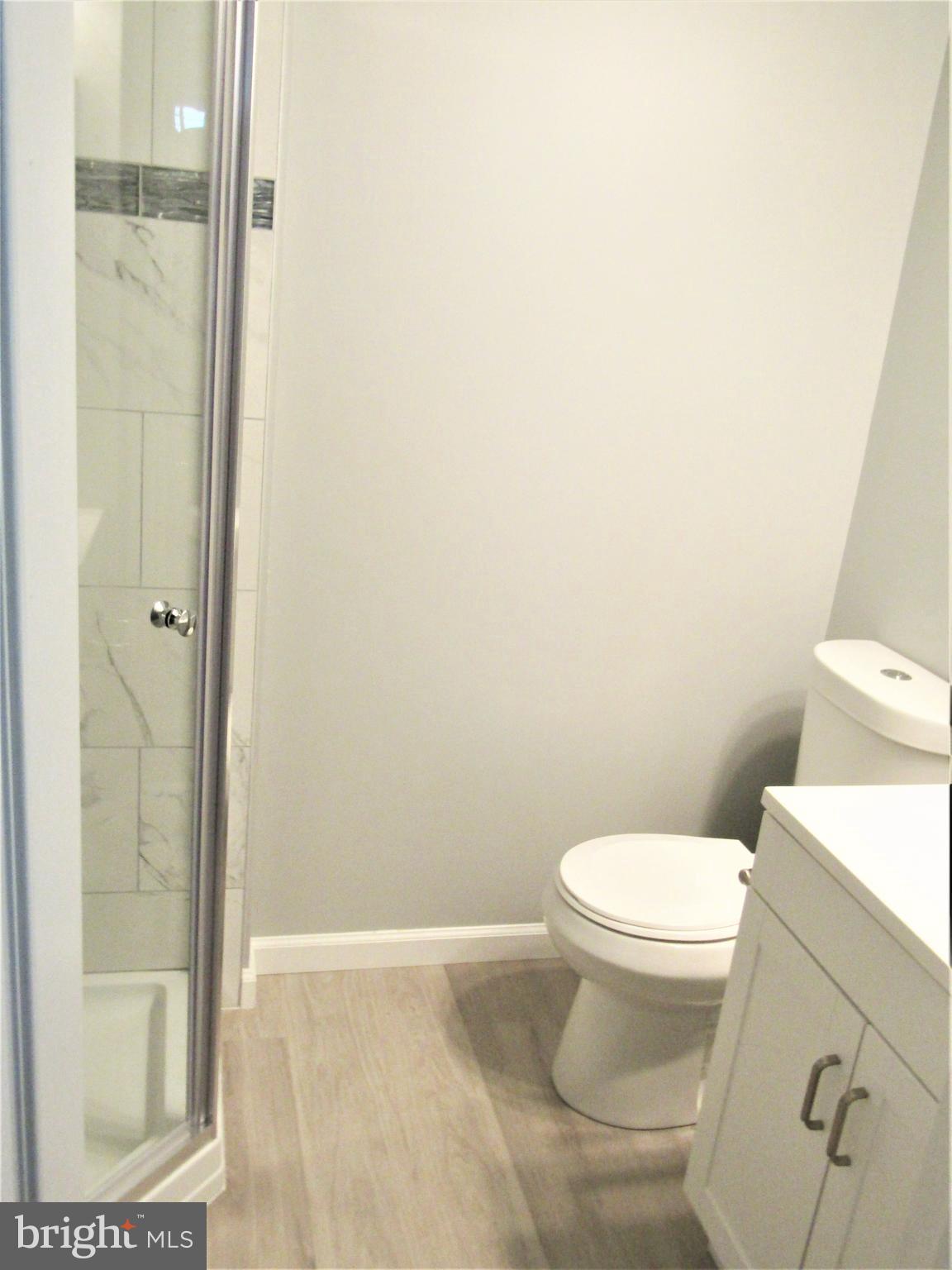 566 Forest View Road Linthicum Heights, MD 21090 - Photo 46 of 51 basement full bath-new toilet and vanity