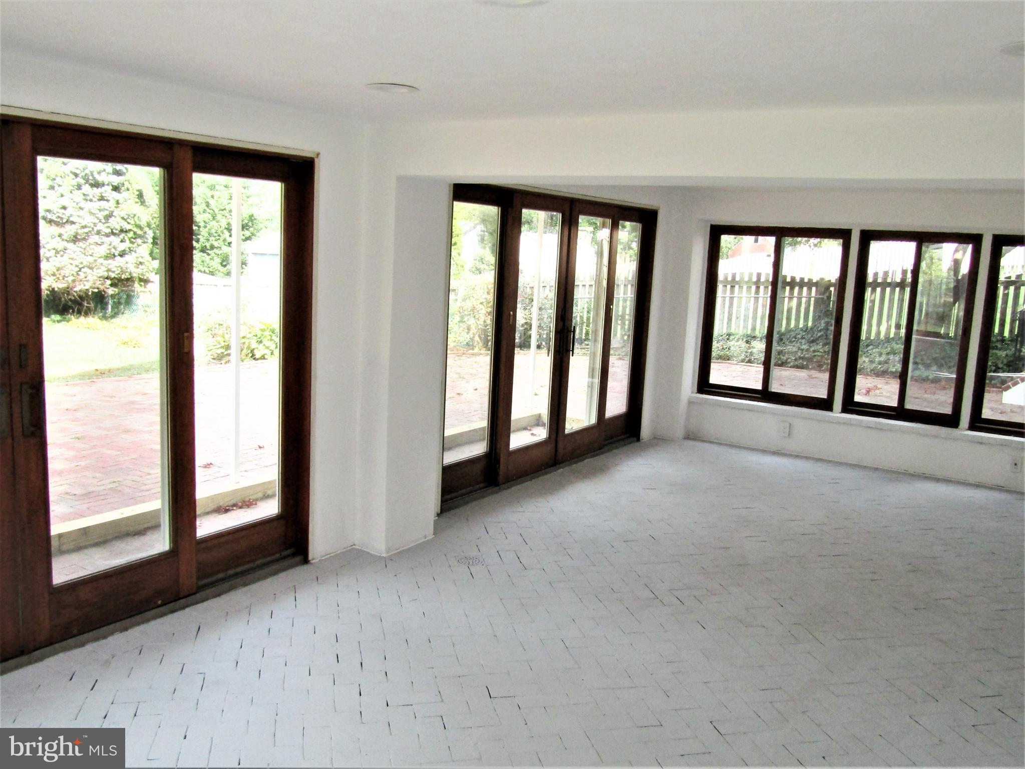 566 Forest View Road Linthicum Heights, MD 21090 - Photo 5 of 51 Enclosed lower level- enclosed 4 seasons room