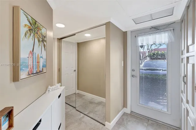 a bathroom with a shower and a sink