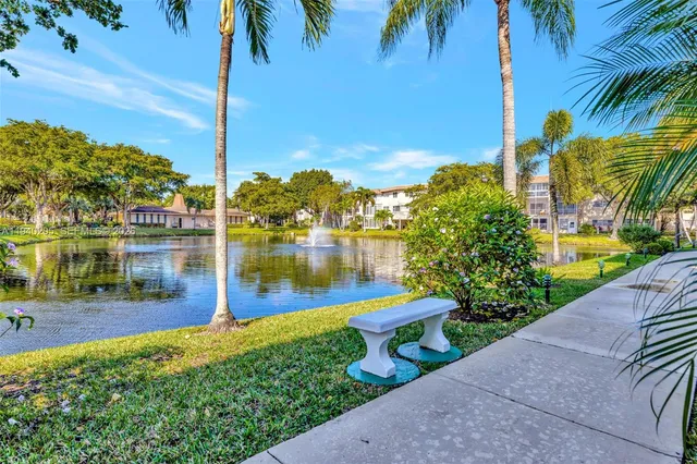 a view of a lake with a park