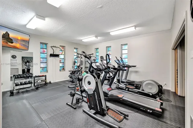 a view of a room with gym equipment