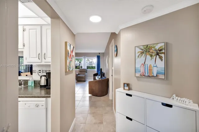 a bathroom with a tub shower and sink