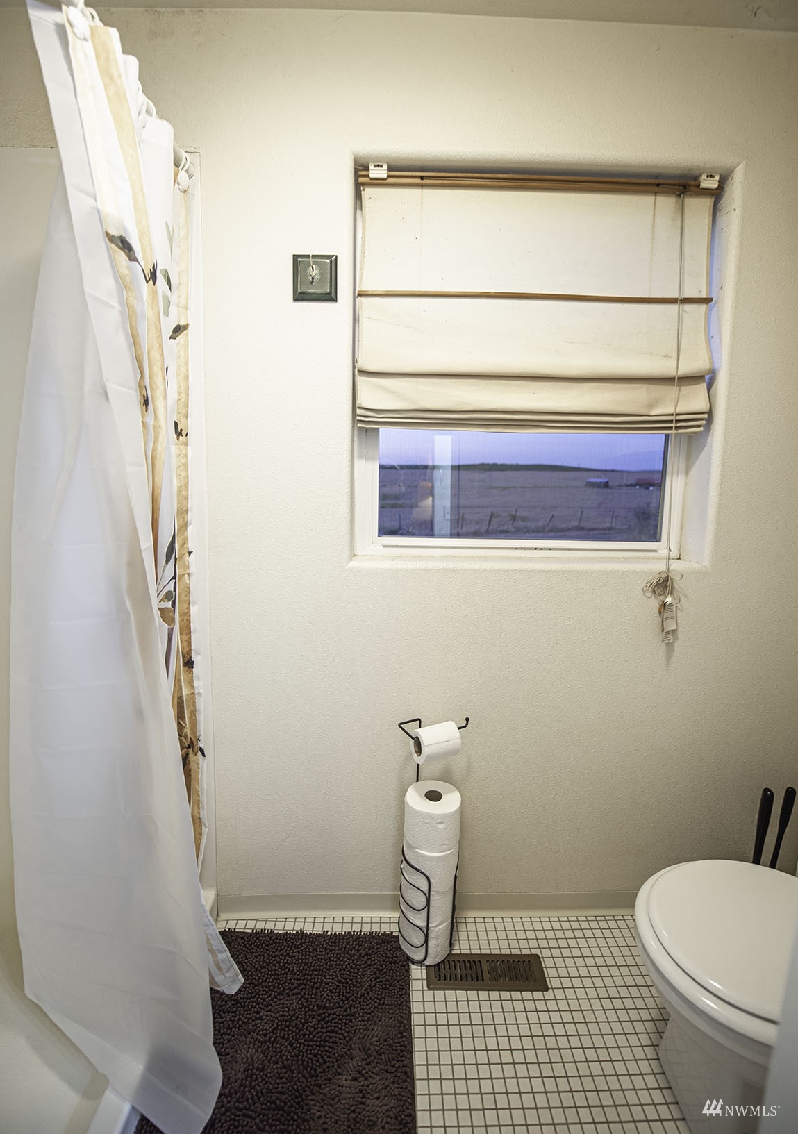 14352 Highway 12 Touchet, WA 99360 - Photo 26 of 40 a bathroom with a toilet and a shower