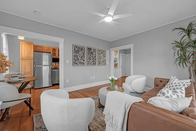 a kitchen with stainless steel appliances a sink a stove a microwave a sink and cabinets