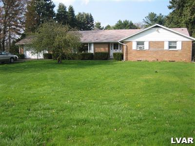 1129 Butztown Road Bethlehem, PA 18017 - Photo 1 of 32 All Brick ranch home on almost an acre lot. Walk to the bank, pharmacy and restaurants. Oversized 2 car garage with opener and long driveway to park all the extra cars, or RV's or campers