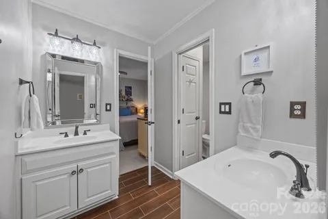 a bedroom with a bed and a desk