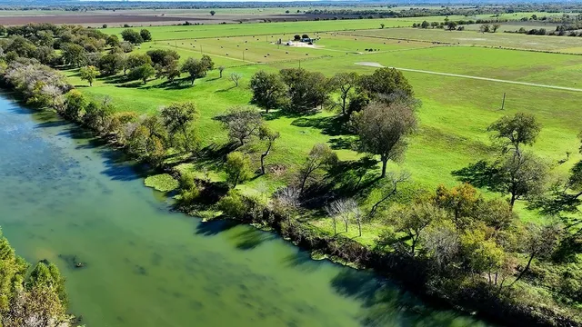 a view of a golf course with a park