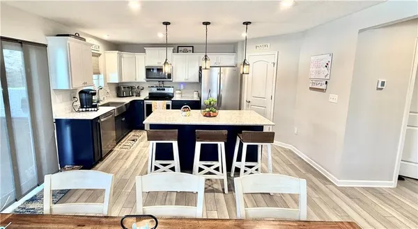 a room with lots of different kinds of flowers