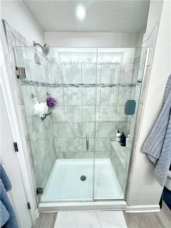 a view of a livingroom with furniture and windows