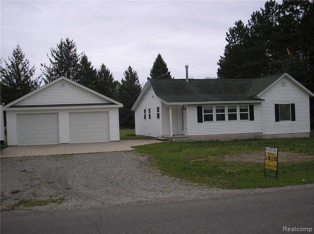 1386 Gun Club Rd home with attached garage with 125 x 225 lot for 92,900.