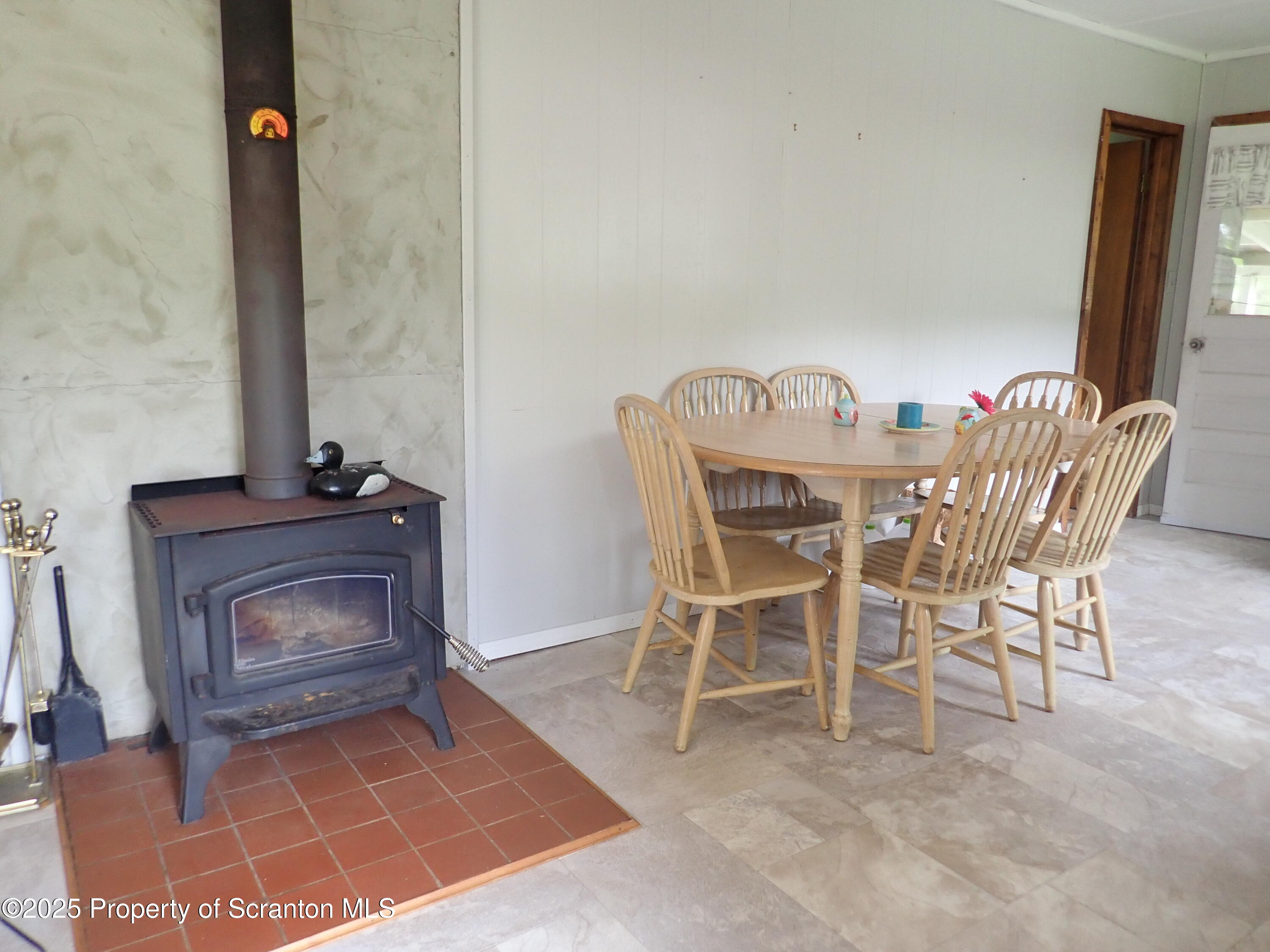 265 South Lk Road Montrose, PA 18801 - Photo 17 of 34 wood stove