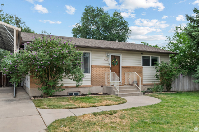 7659 State Street Midvale, UT 84047 - Photo 2 of 33 Ranch-style residence featuring light-colored siding and brick accents