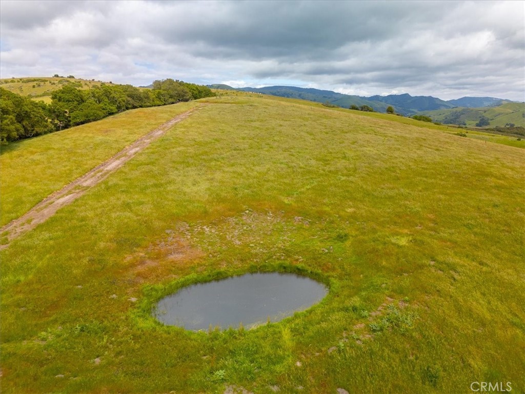 0 Santa Rosa Creek Road Cambria, CA 93428 - Photo 21 of 25 a view of an ocean and a yard