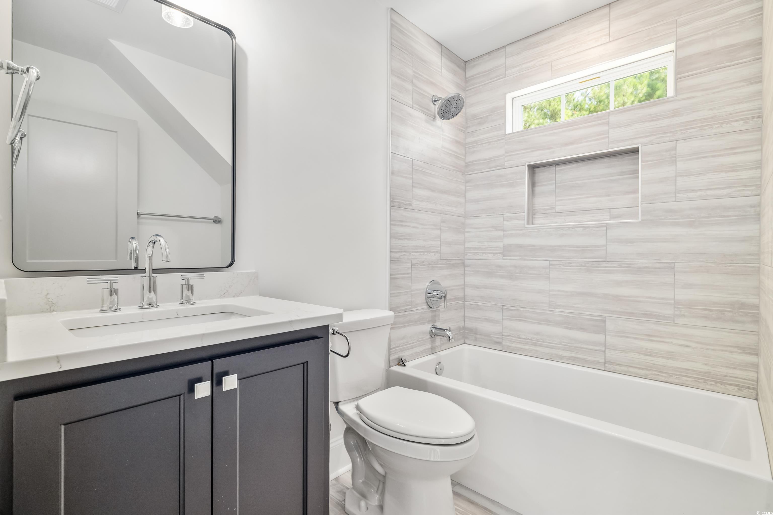 346 Ridge Road Galivants Ferry, SC 29544 - Photo 23 of 28 Bathroom with bathtub / shower combination and vanity