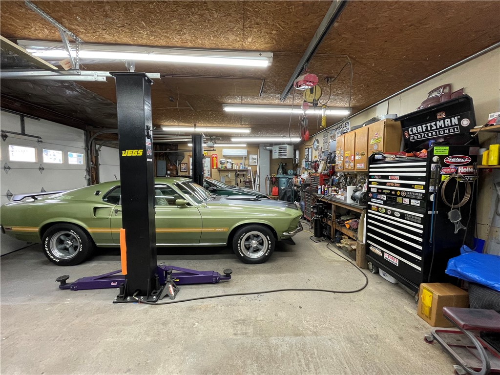 348 Market Street Warren, RI 02885 - Photo 46 of 50 Need as a pin 3 car garage with Electric car lift ( optional.) Industrial air compressor.