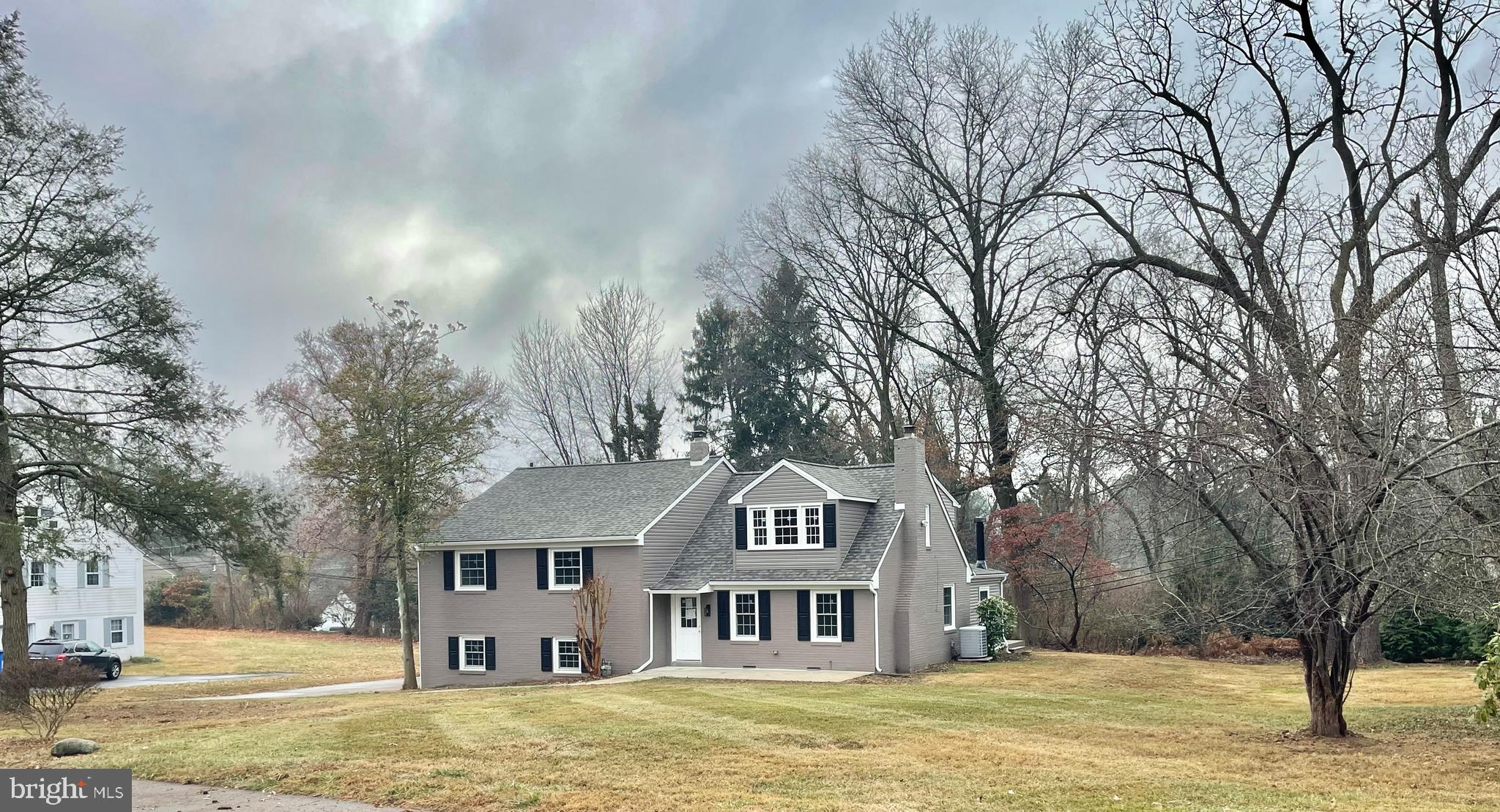 212 Grandview Road Media, PA 19063 - Photo 1 of 49 a front view of a house with a yard