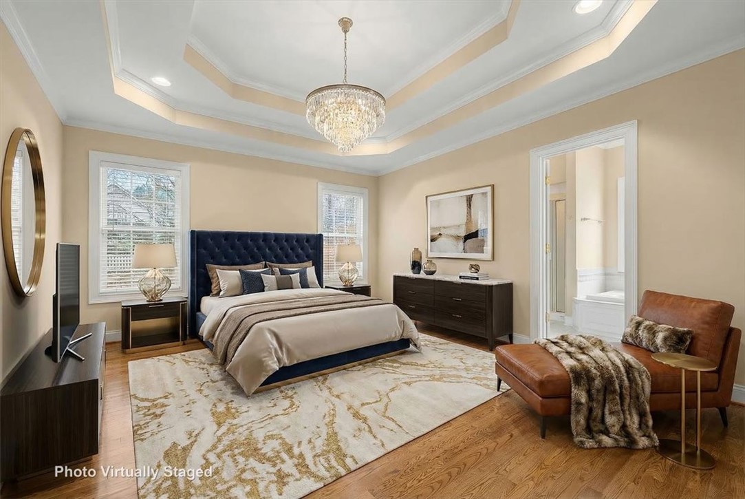 128 Cayman Way Anderson, SC 29621 - Photo 20 of 49 This spacious bedroom offers double tray ceiling. Virtually staged