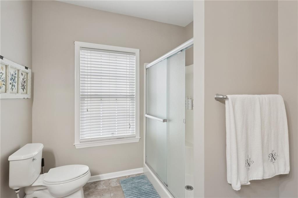 122 Liberty Lane Freedom, PA 15042 - Photo 20 of 50 a white toilet sitting next to a bathroom sink