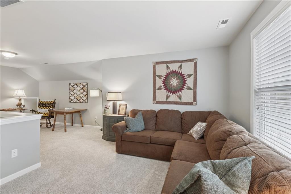 122 Liberty Lane Freedom, PA 15042 - Photo 26 of 50 a living room with furniture and a large window
