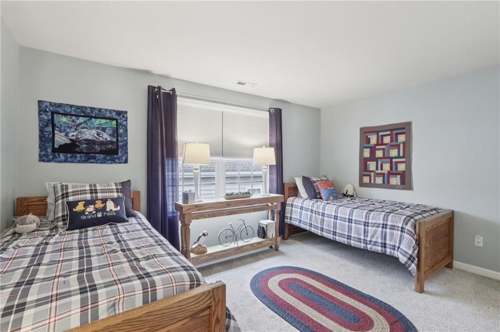 122 Liberty Lane Freedom, PA 15042 - Photo 28 of 50 a bedroom with two beds and a couch