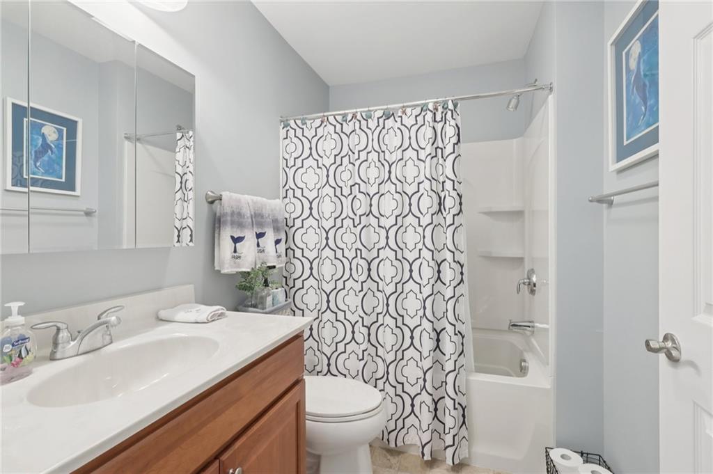 122 Liberty Lane Freedom, PA 15042 - Photo 29 of 50 a bathroom with a sink and toilet