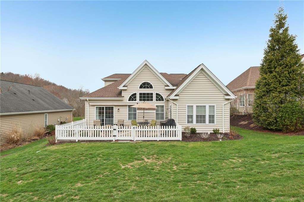 122 Liberty Lane Freedom, PA 15042 - Photo 32 of 50 a front view of a house with a yard and trees