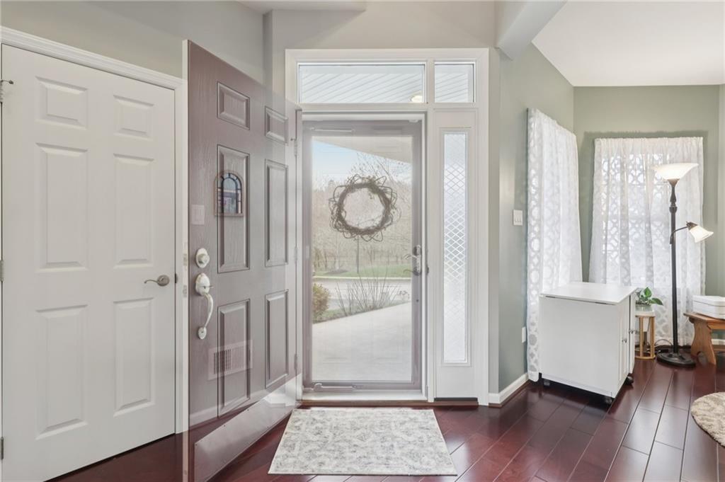 122 Liberty Lane Freedom, PA 15042 - Photo 4 of 50 a view of an entryway with wooden floor and door