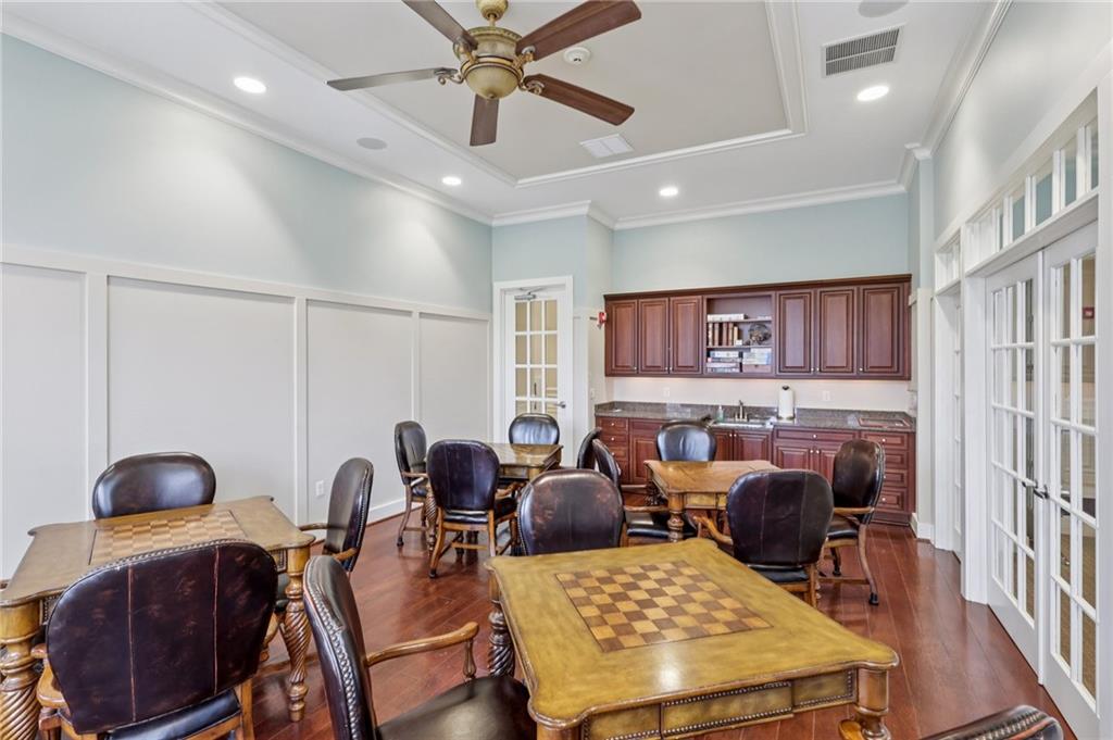 122 Liberty Lane Freedom, PA 15042 - Photo 42 of 50 a living room with furniture a ceiling fan and a rug