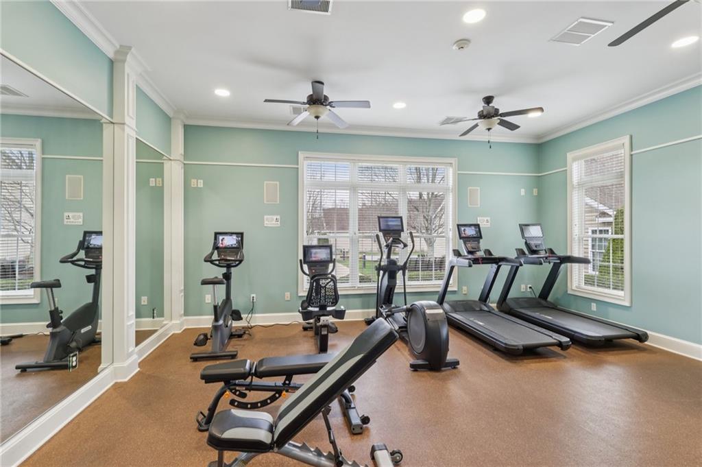 122 Liberty Lane Freedom, PA 15042 - Photo 47 of 50 a room with gym equipment and a large window