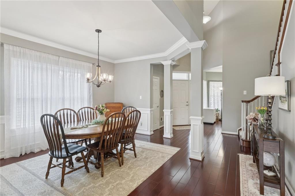 122 Liberty Lane Freedom, PA 15042 - Photo 7 of 50 a view of a dining room with furniture window and wooden floor