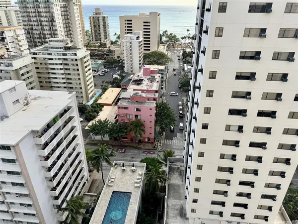 a view of balcony with a couple of chairs
