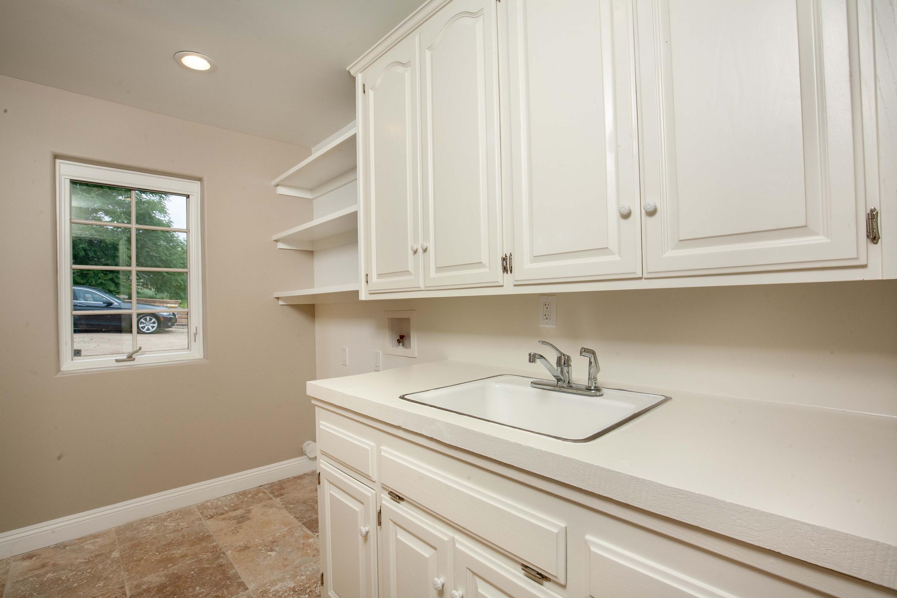 47383 Old Ridge Route Lake Hughes, CA 93532 - Photo 16 of 23 a kitchen with a sink cabinets and window