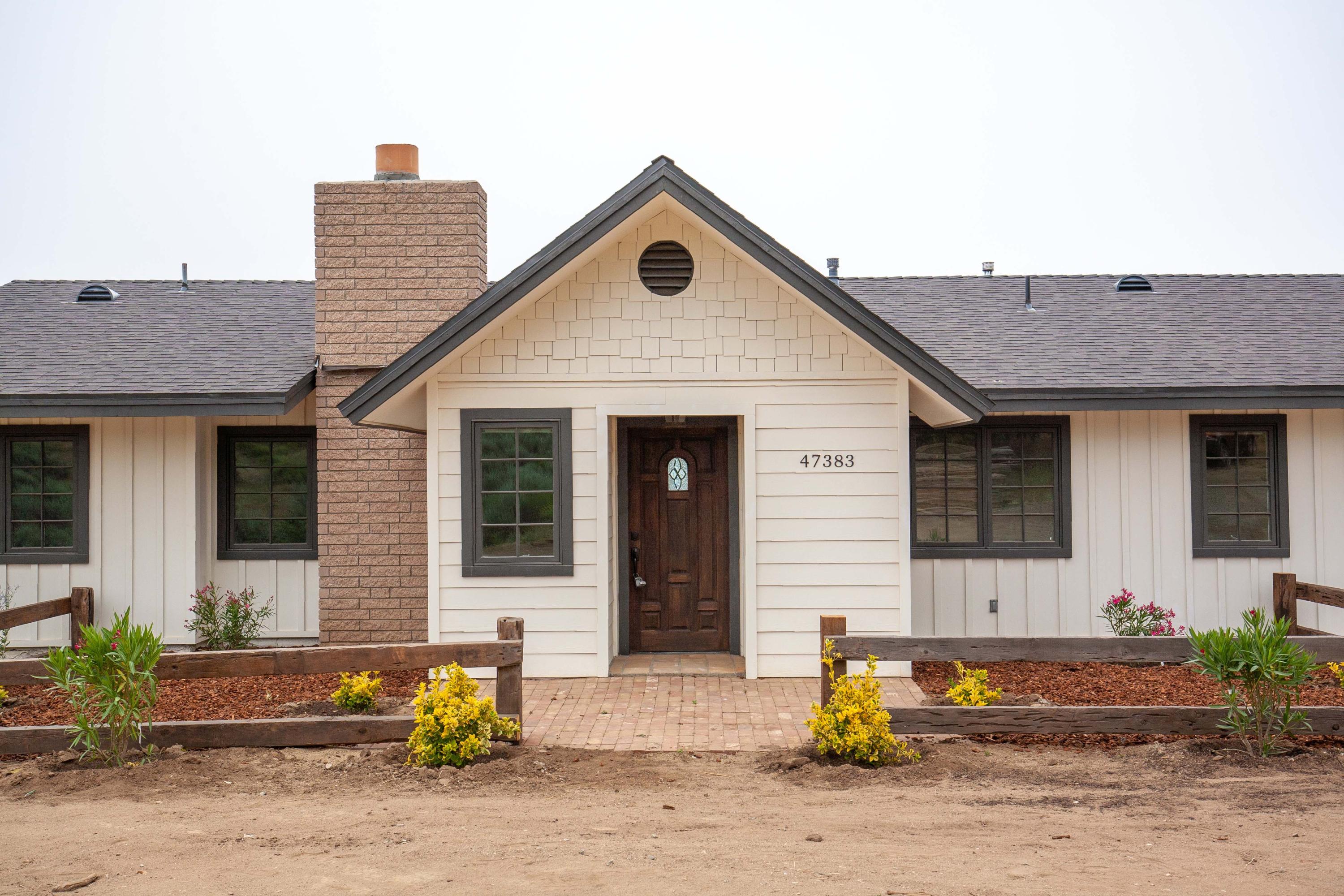 47383 Old Ridge Route Lake Hughes, CA 93532 - Photo 2 of 23 a front view of a house with garden