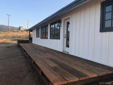 47383 Old Ridge Route Lake Hughes, CA 93532 - Photo 23 of 23 a view of a house with a wooden deck