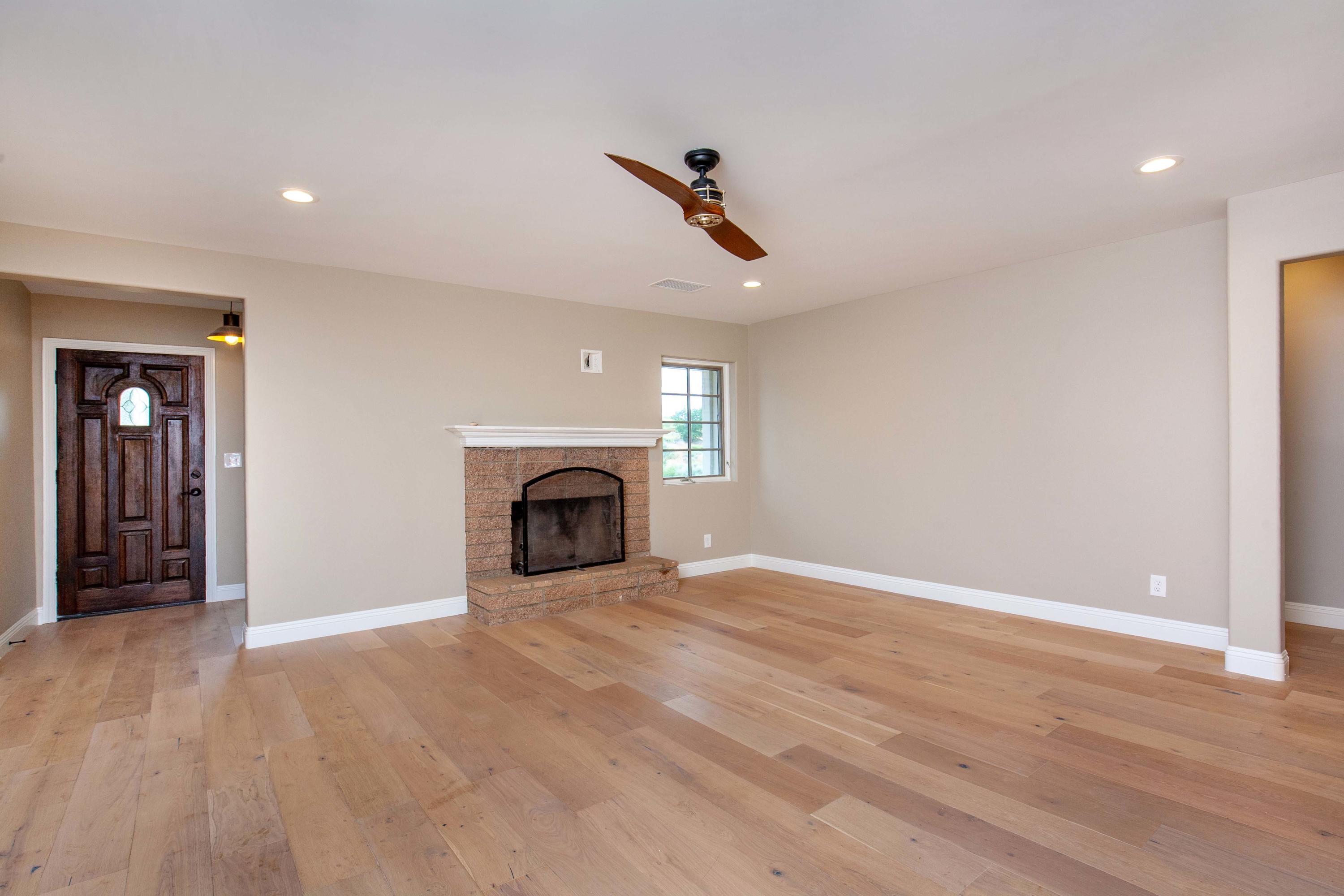 47383 Old Ridge Route Lake Hughes, CA 93532 - Photo 4 of 23 an empty room with windows and fireplace