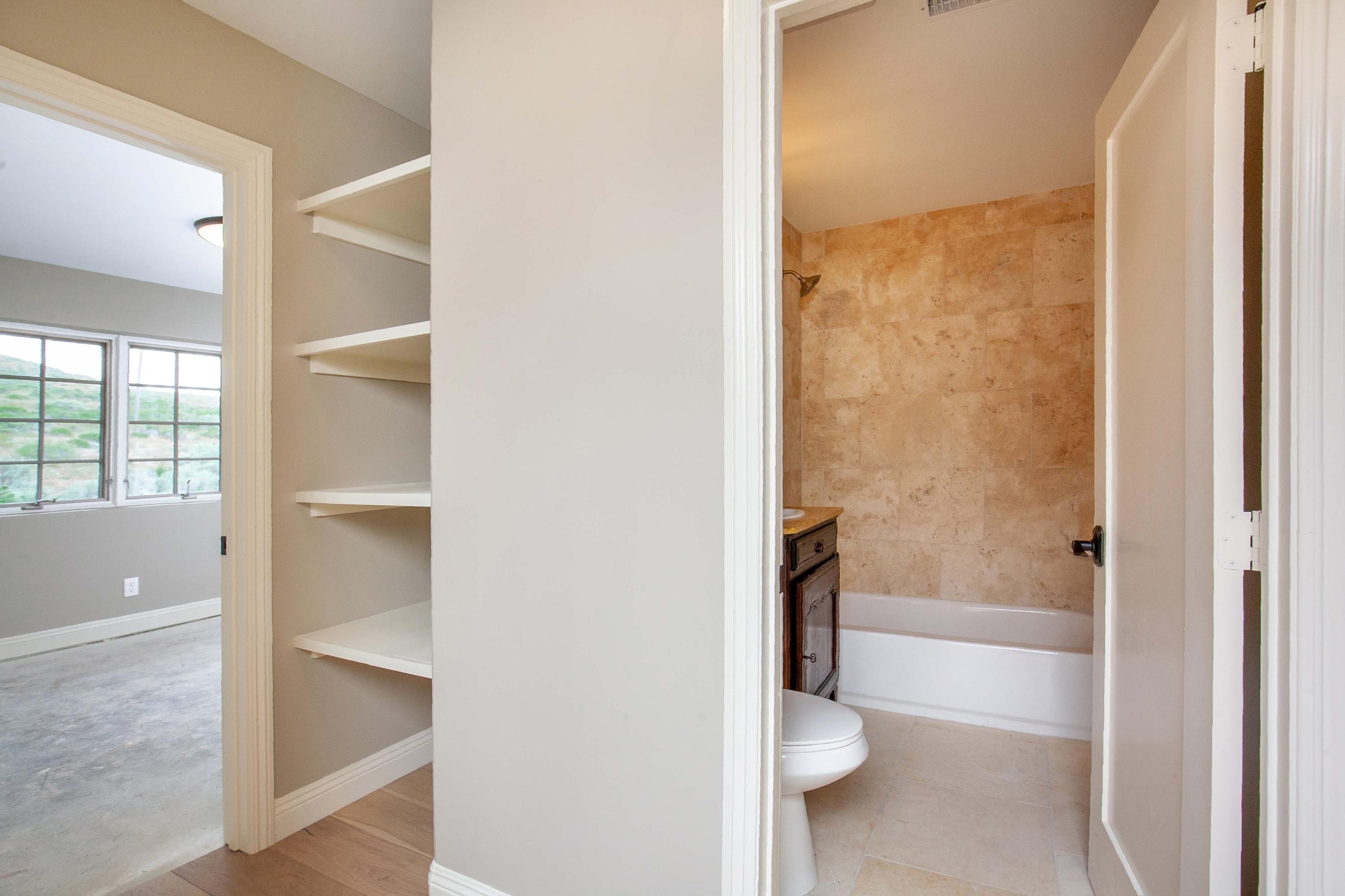 47383 Old Ridge Route Lake Hughes, CA 93532 - Photo 10 of 23 a bathroom with a tub and shower