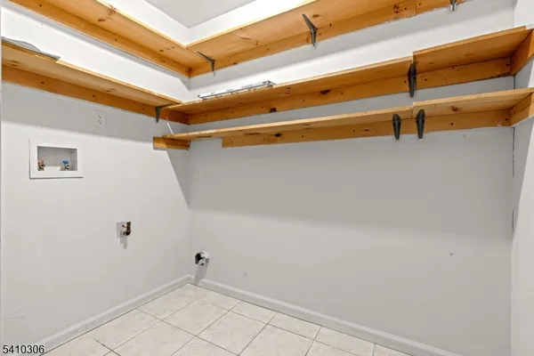 a view of a room with racks on the wall