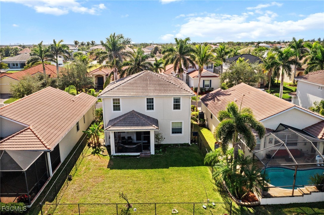 8657 Sumner Avenue Fort Myers, FL 33908 - Photo 29 of 29 a front view of a house with a yard