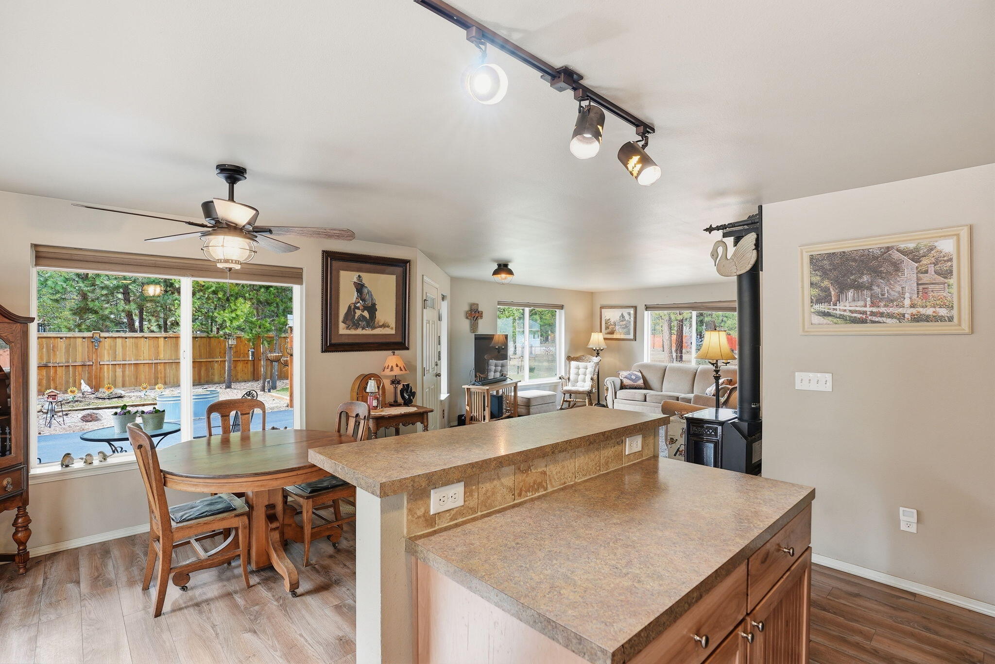 51432 Jory Road La Pine, OR 97739 - Photo 10 of 51 a view of a dining room with furniture wooden floor and chandelier