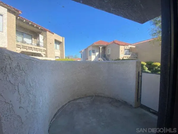 a view of a door in front of a house
