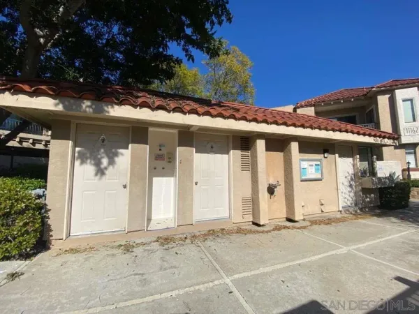 a front view of a house with a outdoor space