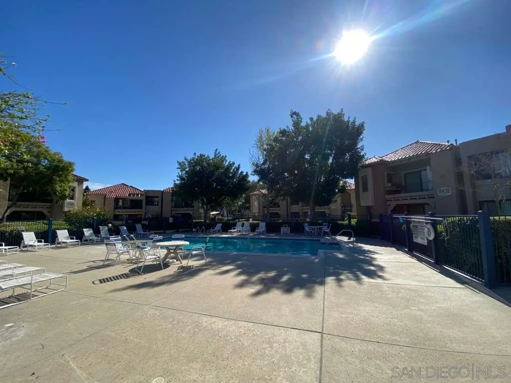 11174 Kelowna Road San Diego, CA 92126 - Photo 7 of 16 a view of a street with houses