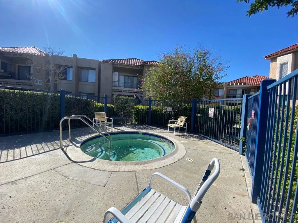 11174 Kelowna Road San Diego, CA 92126 - Photo 8 of 16 a swimming pool with outdoor seating and yard