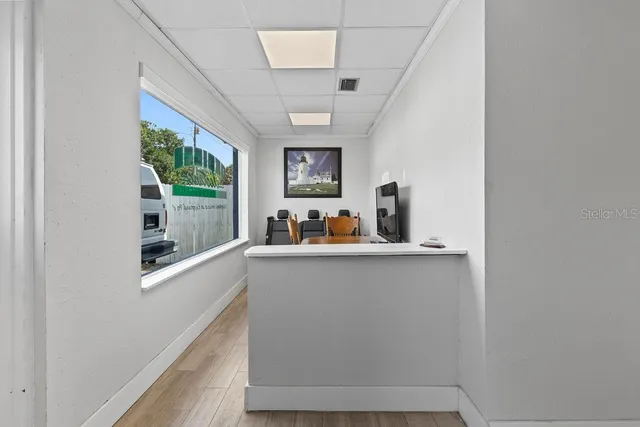 a kitchen with stainless steel appliances a sink and a window