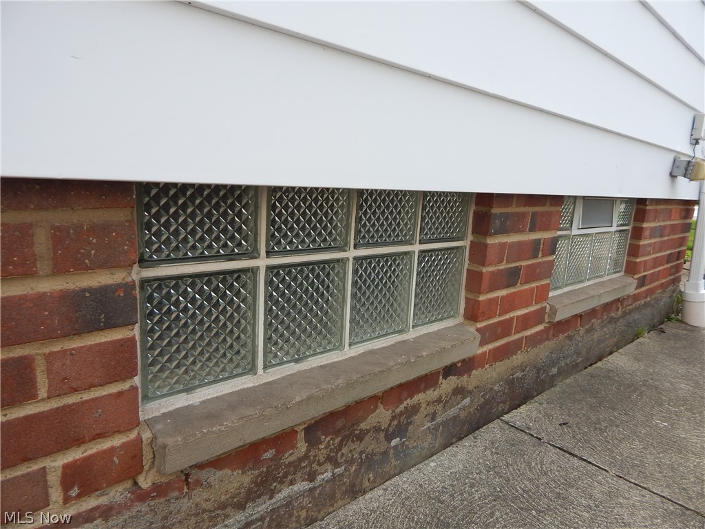 5701 Ackley Road Parma, OH 44129 - Photo 26 of 31 Glass block windows are in.
