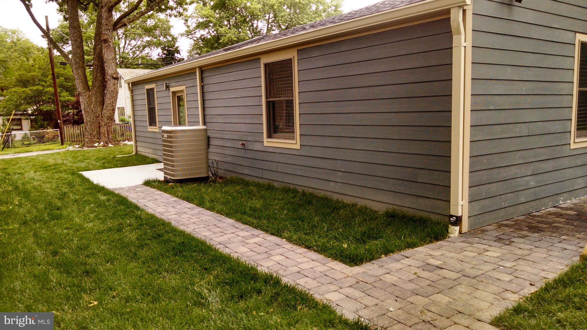 15 McKay Circle Cabin John, MD 20818 - Photo 19 of 20 a view of a back yard of the house