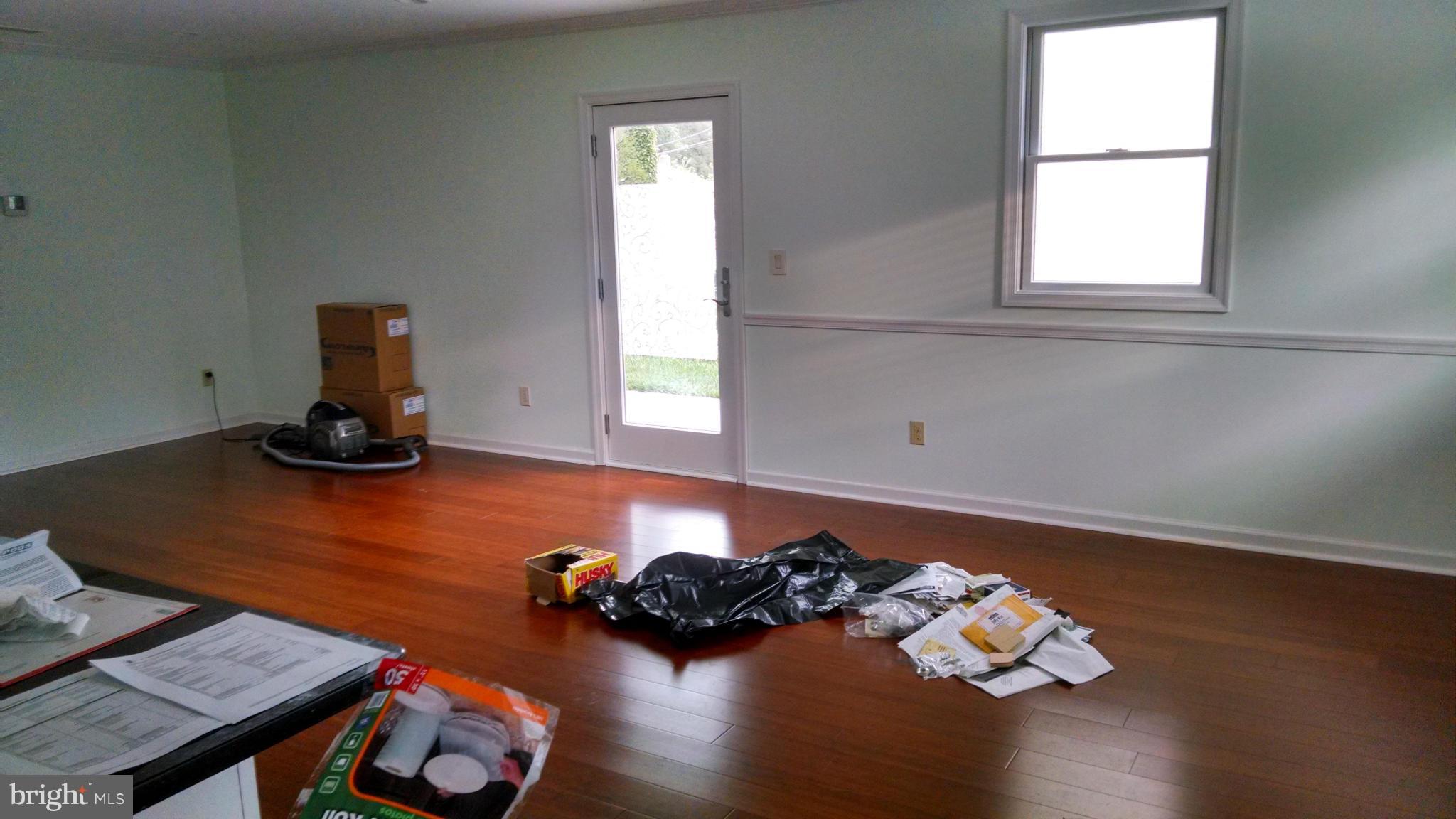 15 McKay Circle Cabin John, MD 20818 - Photo 5 of 20 a room with furniture and wooden floor